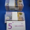 A full bundle of 100 $5 notes from RBA