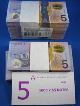 A full bundle of 100 $5 notes from RBA